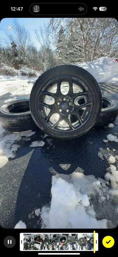 Set of 4 Black Factory Alloy Rims with summer tires (season left to them) Set of 4 Brand new Steelie...