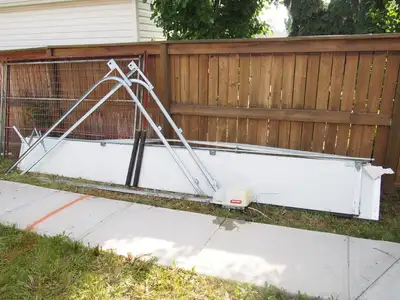 16x8 used garage door. Works well. Model number is on the last picture