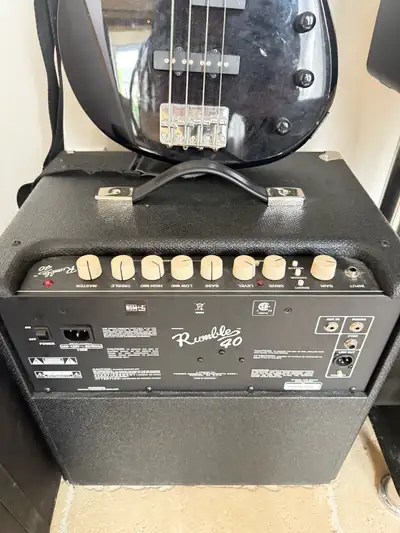 Bass guitar and amp, View more