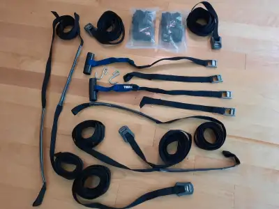 Yakima JayLow, J-Cradle car racks for 2 kayaks with Thule Quick Loop Strap.I am open to selling them...