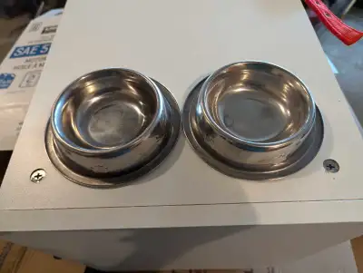 Metal food or water bowls. They are 4-1/2" in diameter. $5 call or text Scott at 780-919-7412