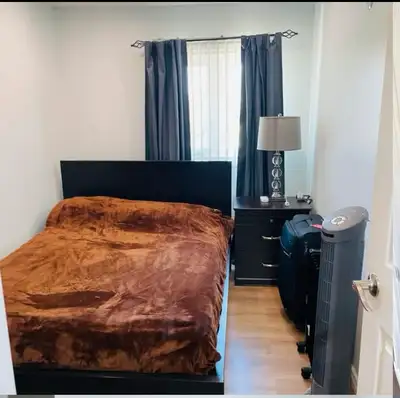 This is a cozy and comfortable, used bedroom in a shared townhouse, perfect for a single occupant. T...