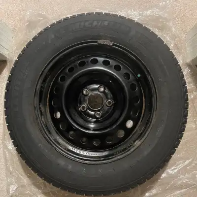 4-Michelin Latitude X-Ice 225/65 R17 Winter Tire & 4-Nissan Rim, used for 1 winter, in good conditio...