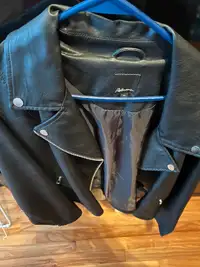 Women’s black leather jacket size 2x for $150