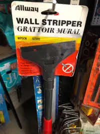 Wall stripper with pack of blades