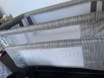 Milliard bedside bassinet sleeper Used but still like new mattress included Smoke free home Has the...