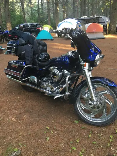 Cobalt blue. Vans and Hines pipes. True duals. Andrews after market can. 6 speed tranny put in. 21 i...