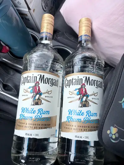2 rum bottles , View more