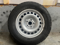 4 winter tires with rims  215/65/15. (5x112) vw golf 2012
