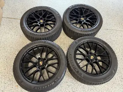 OEM Macan 20" black GTS wheels and Michelin Pilot Alpin 5 SUV tires (in OEM sizes).