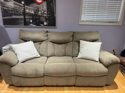 Ashley Furniture Reclining Loveseat with Con, View more