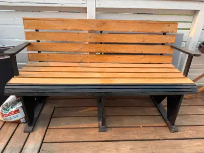 In an excellent condition, wooden hand made bench 155 by 87 cm located in Winkler