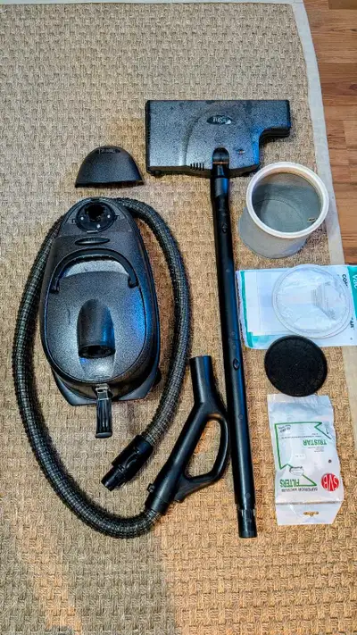 TriStar canister vacuum cleaner with powerhead and accessories, View more