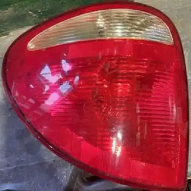 Driver's side tail light. Oil pan. Starter.