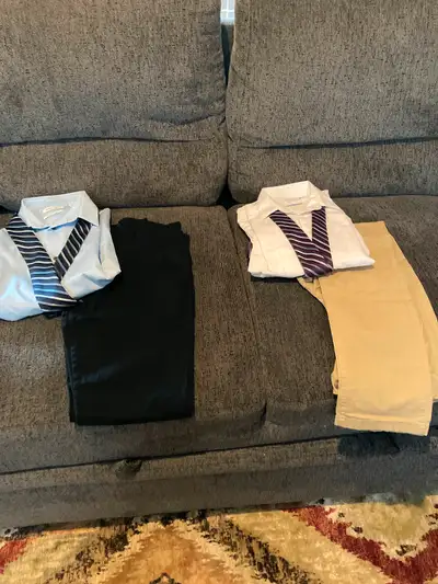 Dress clothes for grad / wedding events Both shirts and ties ( Calvin Klein) Both pants from childre...