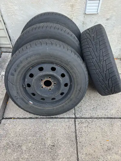 Selling a set of 4 Kumho iZenWinter Tires on mounted on Rims Was previously on a Dodge Caravan Size:...