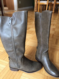 Brand new, bronze color boots. Size . $45