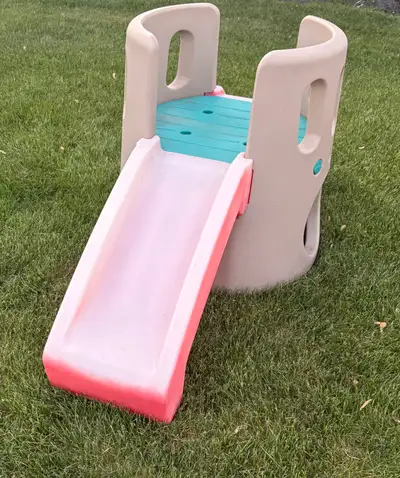 Small Step 2 Climber with Slide. In good used condition, slide and stairs are a bit sun faded, but s...