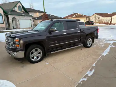 2015 Chevrolet 1500 4 X 4 5.3 L 6spd. Titanium color 40/20/40 seat configuration(leather heated), he...