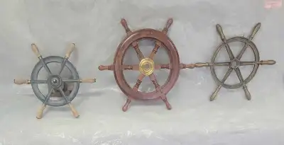 Small ship's wheels from a small sailing vessel. Circa 1920's. Asking $500 for all 3 or $200 each.