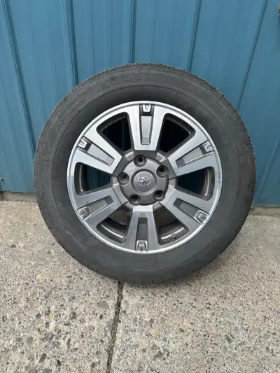 Four OEM Rims with TPMS Sensors on original tires with one summer season left on them (275/55/R20)....