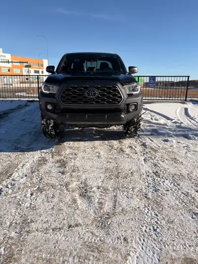 Pretty firm on price excellent car, no damage anywhere. It’s a 2020 Toyota Tacoma TRD Off Road 4x4 M...