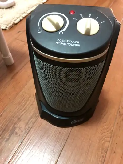 Portable space heater. Can control the temperature and oscillation (moves left-right to heat evenly)...