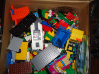 box of lego blocks and books. medium box mix