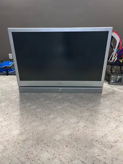 Samsung 52” DLP TV And TV Stand, View more