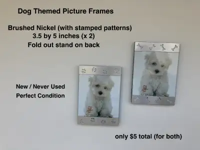 Dog Themed Picture Frames : - brushed nickel, with stamped designs - 3.5 by 5 inches - fold out stan...