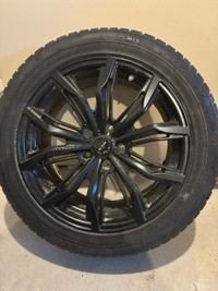 Chevy Aluminium Wheels with winter tires on them