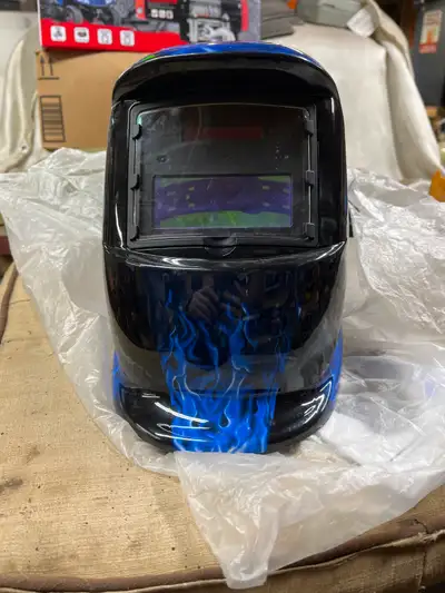 Auto Darkening Welding Helmet New $60.00 Yes it's available don't ask This ad will be removed when i...