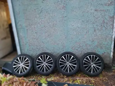 VW RIMS & TIRES I have a set of 4 rims and tires for a vw. The tires have less than 1000 kms on them...
