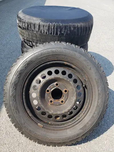 I am selling four (4) FIRESTONE WINTERFORCE tires mounted on steel rims. These tires are in near min...