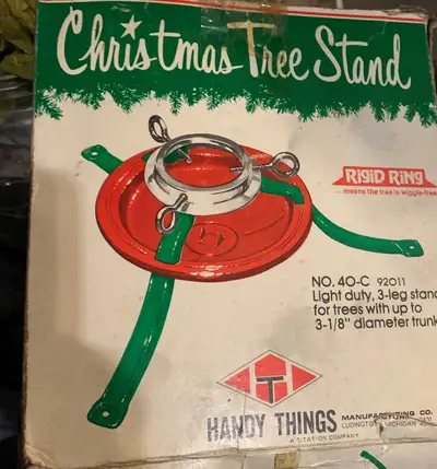 Vintage 1970's Red & Green Rigid Ring Metal Christmas Tree Stand- MIB $10...............donnie.........