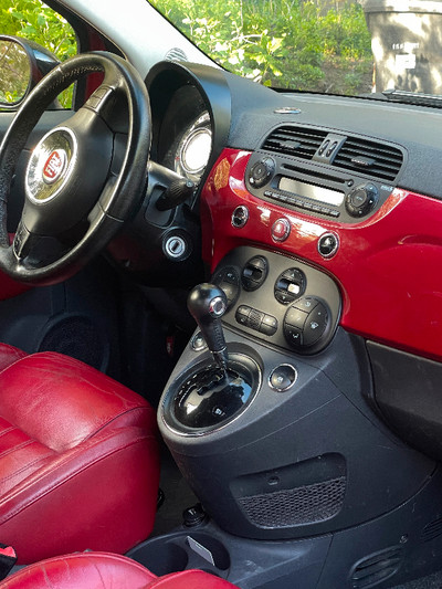 2012 red Fiat 500 lounge Cabriolet