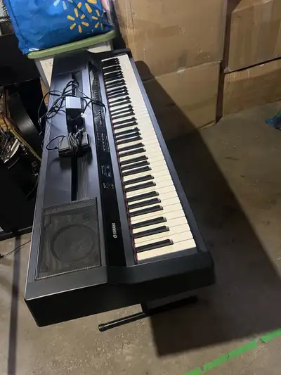 Excellent sounding yamaha piano w/ 88 keys works perfect, View more