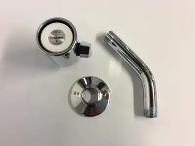 A new Moen showerhead, stem and escutcheon, never used, in polished nickel finish.