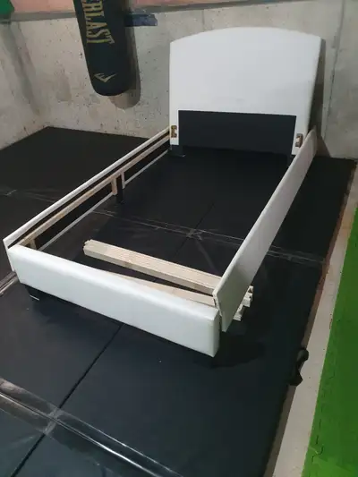 Single bed leather white in excellent condition, View more