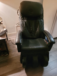 fauteuil noir pour massage électrique