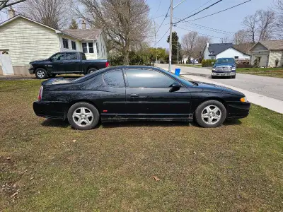 This 2000 Chevrolet Monte Carlo is ready to hit the road with its reliable engine and sleek black ex...