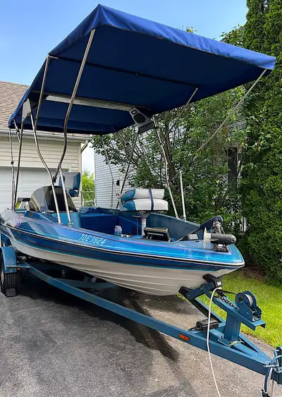Price reduced to $$8300. In good shape. Comes with all the gear seen in photos, ski tow bar, trailer...
