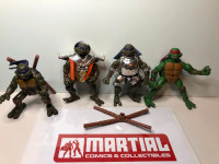 Lot of 4 Teenage Mutant Ninja Turtles TMNT action figures 02-04