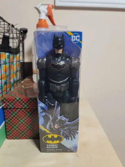 Combat Batman Figure, price can be negotiable. Never been open just has been touched and moved aroun...