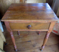 Antique pine side table with turned legs and a dovetailed drawer
