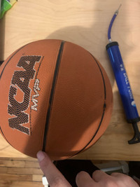 Basketball and inflater 