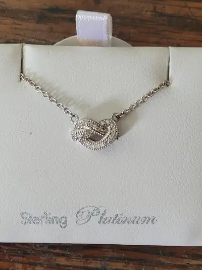 Sterling Platinum Necklace with Love Knot Pendant, View more