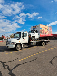 Tow truck services flat bed Calgary  and all AB 