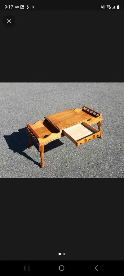 Solid wood vintage coffee table with 1 drawer. The table is in great condition and legs can be remov...