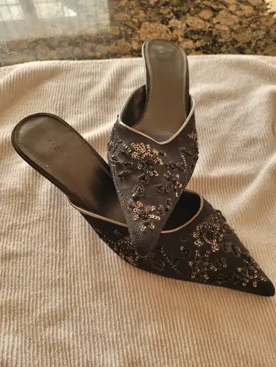 Black fancy embellished open back heels with 2 inch heels. Worn once.